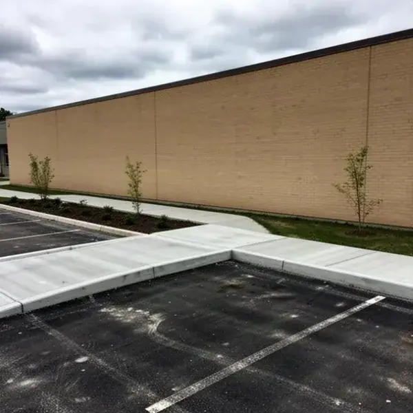 Plaza curb and sidewalk Concrete curb and sidewalk at a Cambridge retail plaza