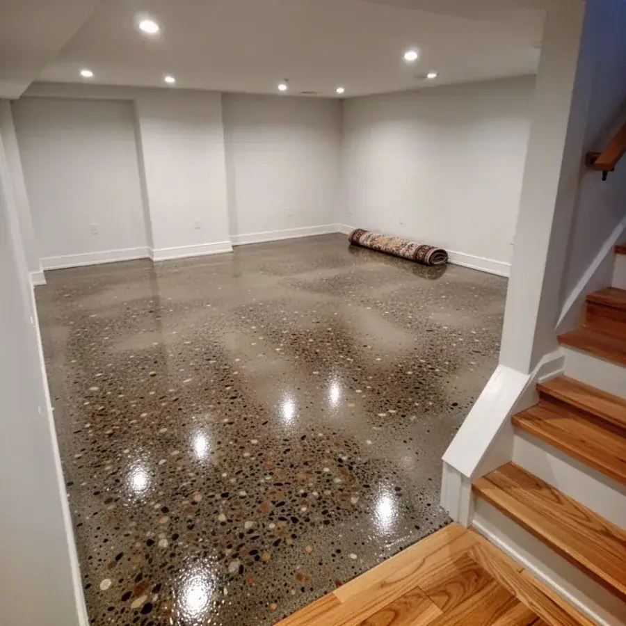 Full aggregate polished concrete basement floor in Waterloo home