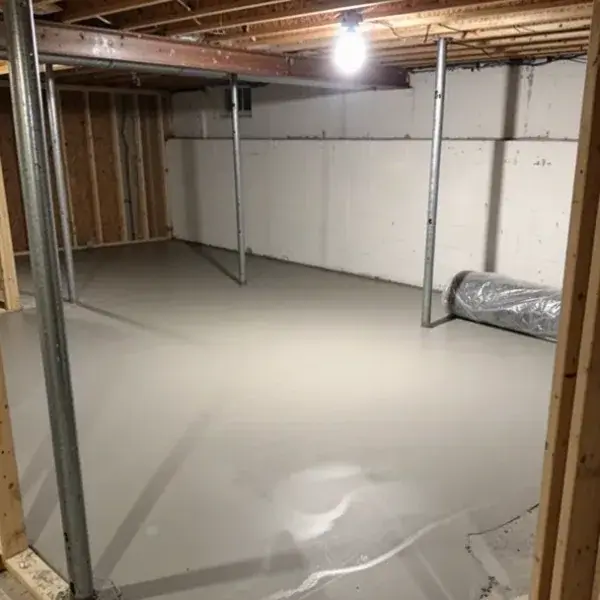 Basement floor flattened and primed Self-levelled basement concrete floor ready for new flooring